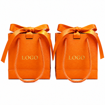 Paper bags · Kraft paper · Ribbon handles